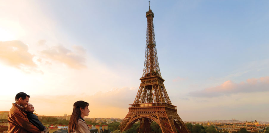 Tourists enjoying the view of the Eiffel Tower – Paris, France